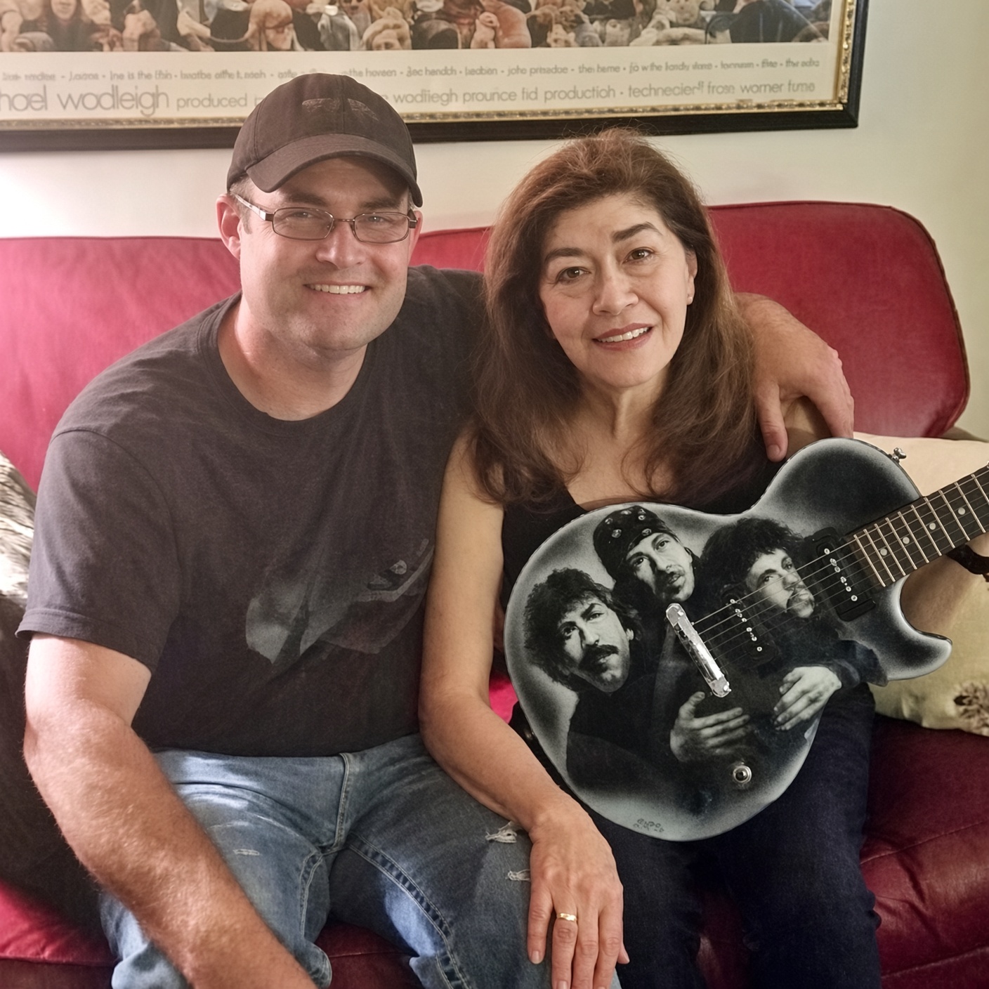 Custom airbrushed guitar with a band portrait